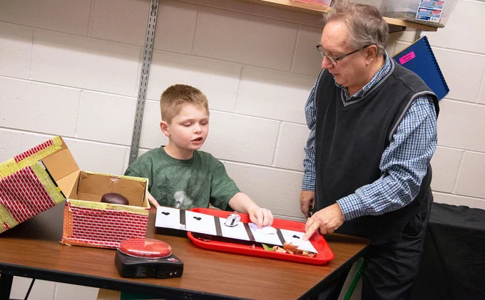 An instructor works with a young student at the Nebraska Center for the Education of Children who are Blind or Visually Impaired in Nebraska City.