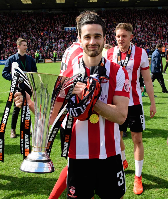 Sam Habergham with the National League trophy.