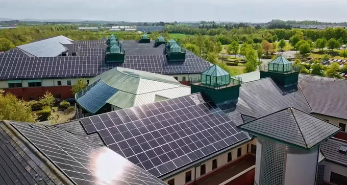 Aerial view of Causeway Hospital with solar panels on the roof.
