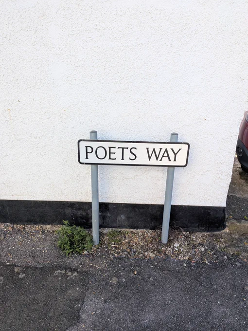 Road sign reading Poets Way
