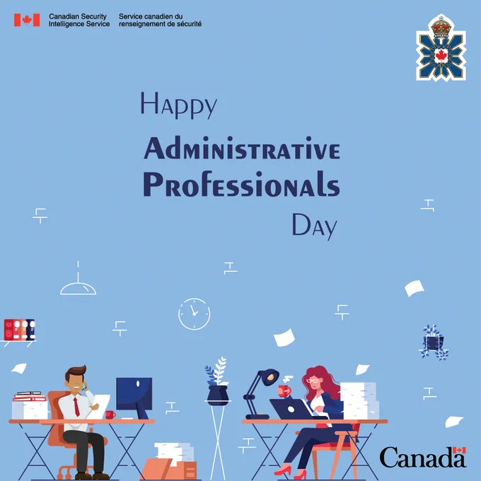 Two business people at an office. It reads “Happy Administrative Professionals Day.”