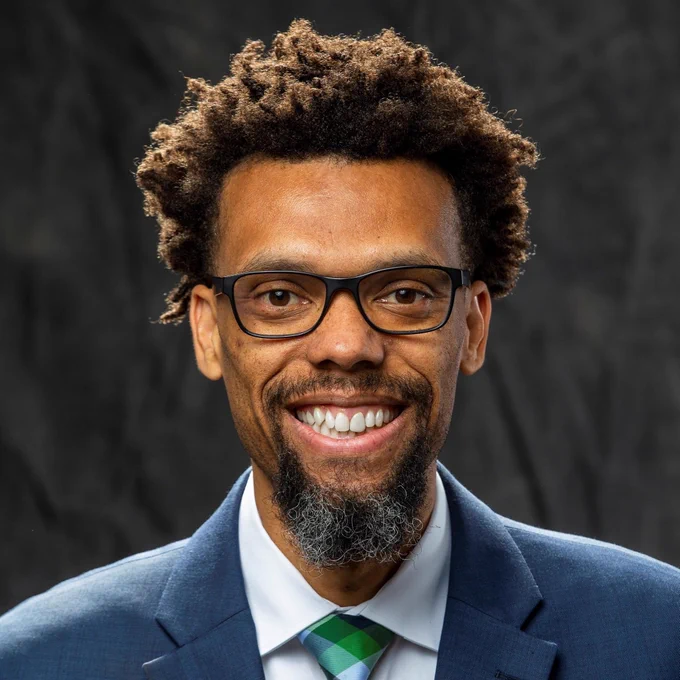 Headshot photo of Traco Matthews