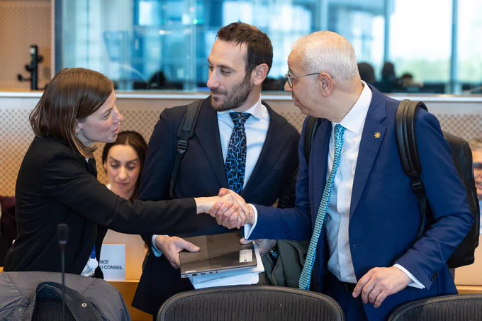 EMPL Chair Li Andersson shakes hands with the deputy ambassador of the Cyprus presidency.