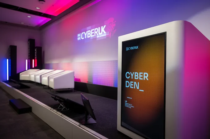 Side stage at Cyber UK with podium "Cyber Den".