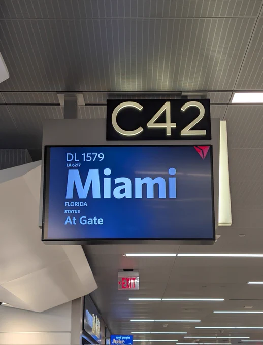Delta Airlines gate screen showing a destination of Miami