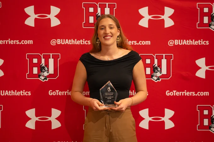 Anete Adler with her team award