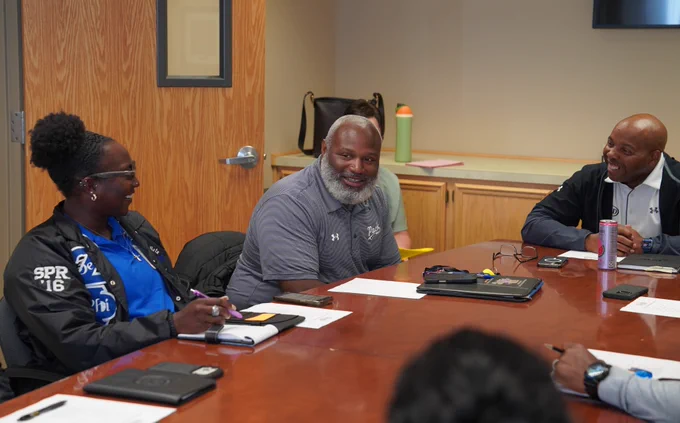 Roy Locks in a meeting