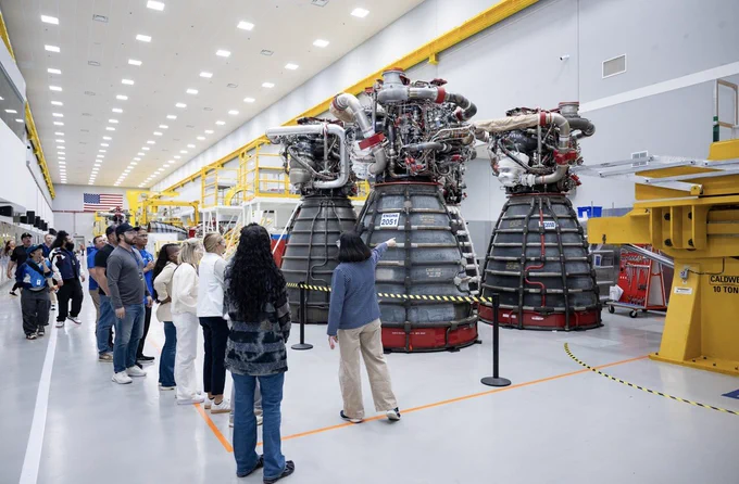 The NASA Social group hears from subject matter experts about the engines that will be used for Artemis 3, 4, and 5. Credit: NASA Stennis