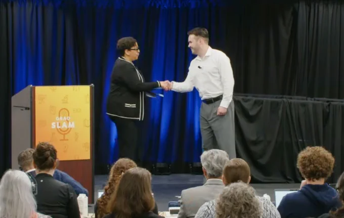 Jack Goon shaking the hand of Yvette Gullatt, UC Vice President, Graduate and Undergraduate Affairs, and Vice Provost, Equity, Diversity and Inclusion.