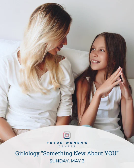A person with long hair sits on a couch, smiling and looking at a young individual with long hair. Both are wearing white tops. The image contains text: "Tryon Women's Center, girlology 'Something New About YOU,' Sunday, May 3.