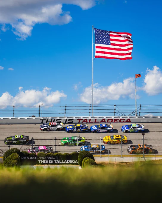 A photo of the pack racing at Talladega Superspeedway in 2025. 