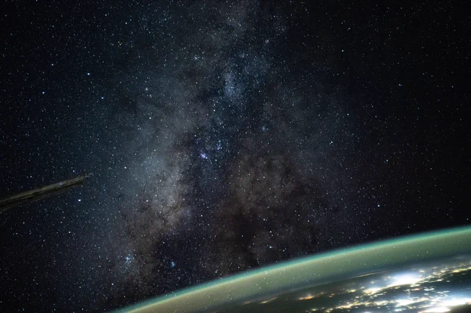 The Milky Way appears above Earth's bright atmospheric glow in this photograph from the International Space Station. Credit: NASA