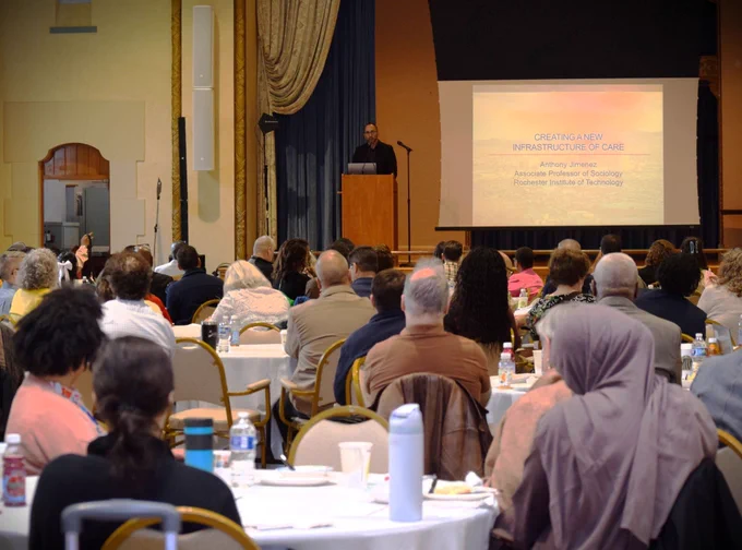 Anthony Jimenez, PhD, RIT, keynote speaker on stage with audience looking on.