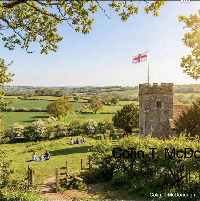 A wide-angle, sun-drenched view of the idyllic English countryside on a bright spring day. In the foreground, a medieval stone church tower stands among lush green hedges, with a correctly proportioned Saint George’s Cross flag (red cross on a white field) flying proudly from its roof. To the left, two small groups of people are enjoying a peaceful picnic on a grassy hillside in the shade of a large tree. The background stretches out into a vast expanse of rolling green fields, hedgerows, and distant woodlands under a clear, warm sky. In the bottom right-hand corner, the name "Colin T. McDonough" is written in clean, white text.