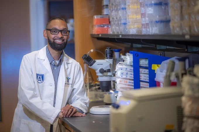 A male scientist in a lab.