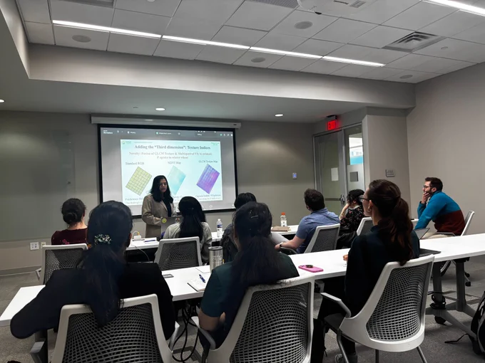 Graduate student Sheetal Kumari giving a presentation at Syngenta with the Career Exploration Initiative attendees and Dr. Rachel Egger. 