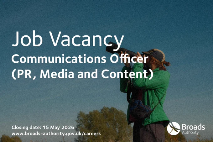 A job vacancy advertisement for a Communications Officer (PR, Media and Content) at the Broads Authority, closing 15 May 2026, with a person using a telephoto camera lens outdoors against a blue sky.