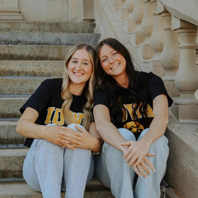 Two students in Iowa t-shirts.