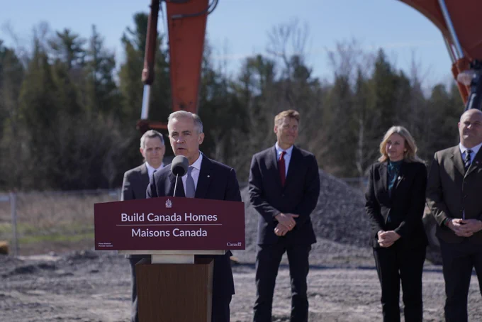Prime Minister Carney at a podium in Nepean, Ontario.