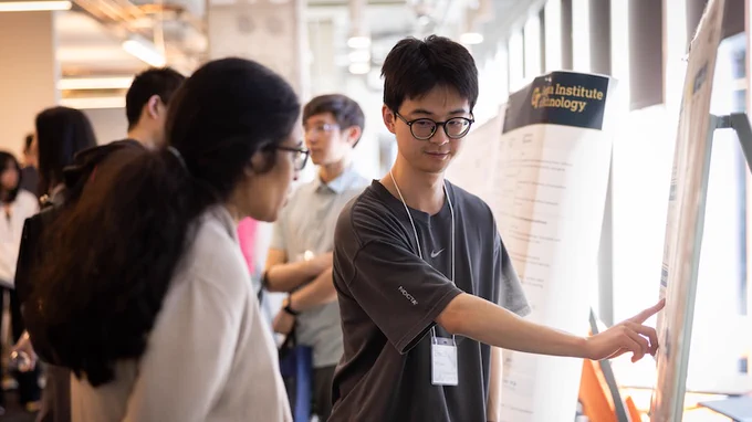 School of CSE Ph.D. student Zihao Zhao presents a poster on Diffusion-DFL on March 12, 2026. 

Diffusion-DFL makes more accurate decisions than current approaches. Along with optimizing industrial output, Diffusion-DFL lowers costs and reduces risk. Experiments also showed it performs across different fields. Diffusion-DFL doesn’t just surpass current methods; it also predicts more accurately as problem sizes grow. The model requires less computing power despite these high-performance marks, making it more accessible to smaller enterprises. Diffusion-DFL runs on diffusion models, the same technology that powers DALL-E and other AI image generators. It is the first DFL framework based on diffusion models.