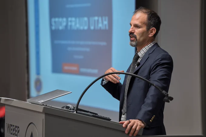Acting Assistant Special Agent in Charge Mike Montoya speaks during a joint AARP Scam Jam event.