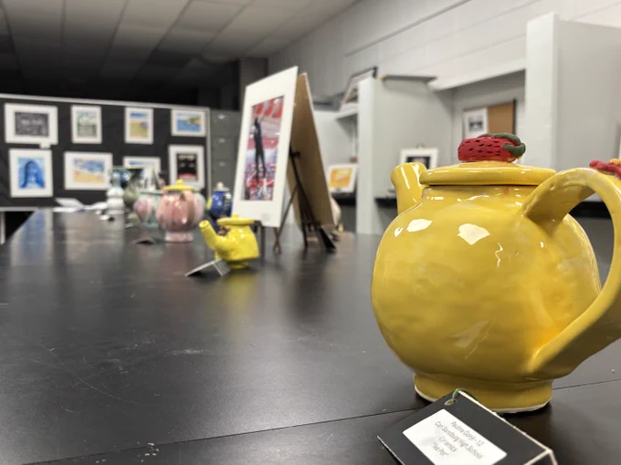 Various art student art projects, including ceramics and paintings.
