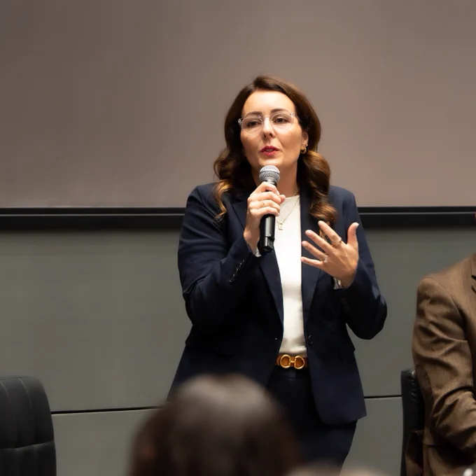 Dr. Tawny Dotson, addresses students, employees, and community members during a public forum.