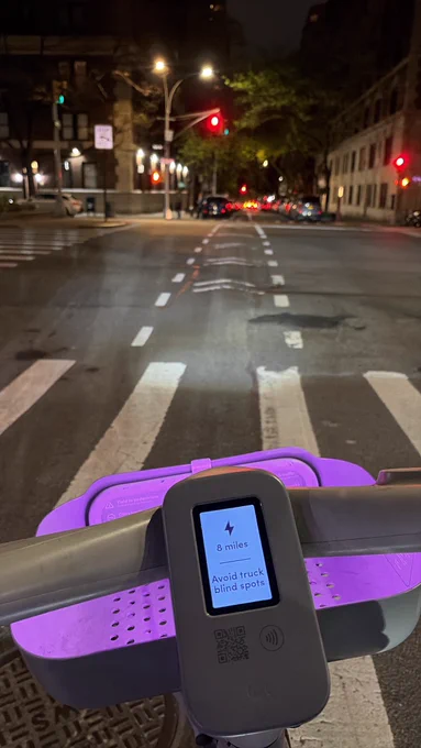 a photo of a citibike at a crosswalk