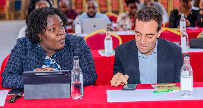 Moloyce Esther from Ministry of ICT and Adam Lane, Director for Policy and Partnerships at Huawei.