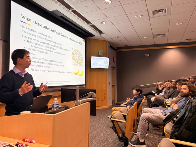 Jason Cong presenting a presentation, titled “Efficient General Intelligence - When Novel Models Meet Customized Silicons"