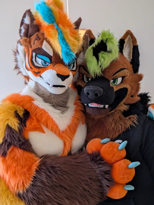 Kovu Tiger and Delta in fursuit posing together