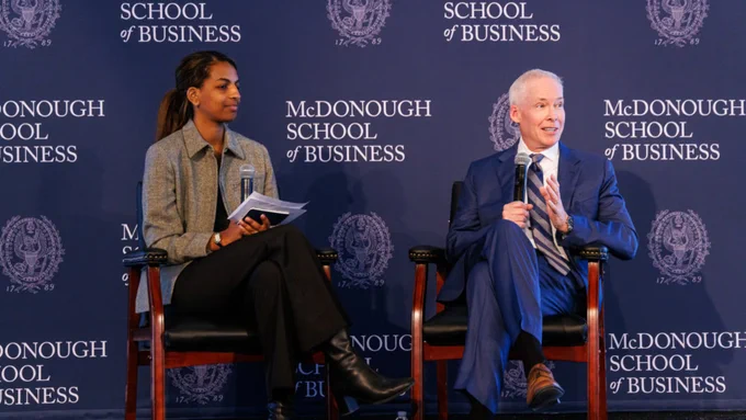 Michael McDonnell speaking on stage.