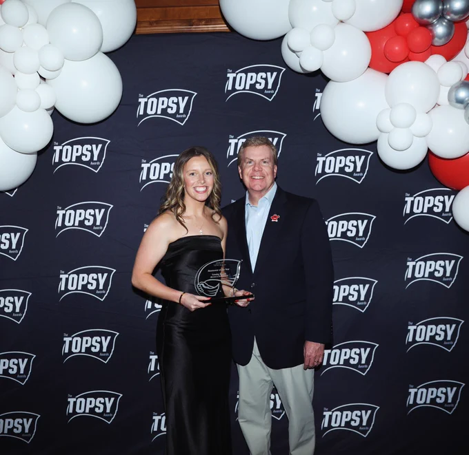 WKU women’s basketball student-athlete Trinity Rowe accepts the Newcomer of the Year Award at the 2026 TOPSY Awards alongside Athletic Director Todd Stewart