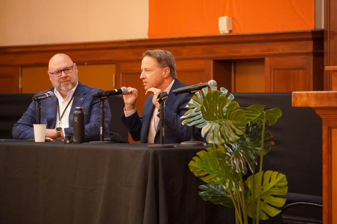 James P. Frazee and Cole Camplese speak onstage during the keynote conversation at Responsible AI for Education. 