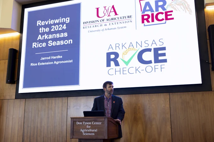 Jarrod Hardke giving presentation at 2025 Rice Industry Alliance Meeting.