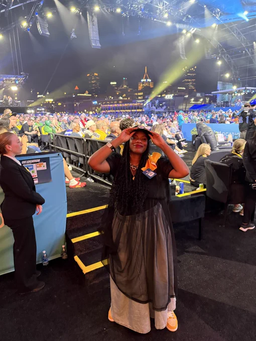 Me standing proudly with my Black and Yellow. Draft crowd in the immediate background and the Pittsburgh skyline in the far background. 