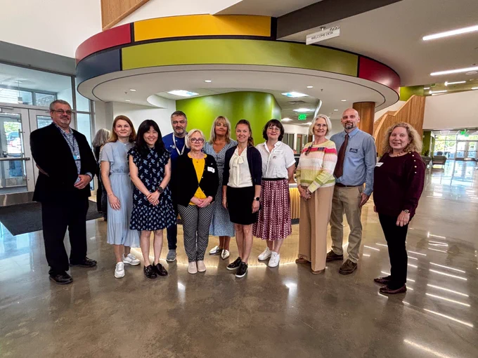 large group of Harford staff members with eight visitors from Estonia