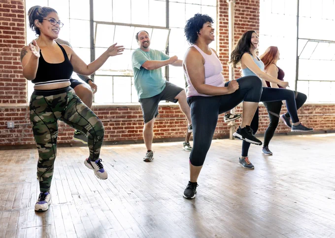 People taking a dance class. 