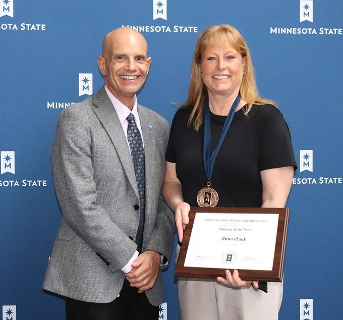 Dr. Anita Gaul and Minnesota West President Dr. Terry Gaalswyk with framed award presented.