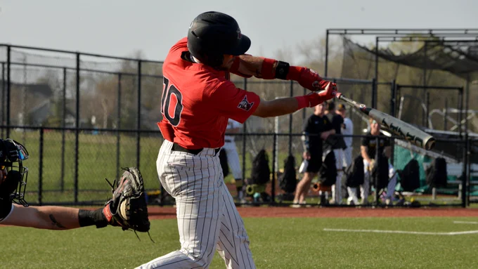 Josh Miller connects for a hit at Gustavus earlier this week.