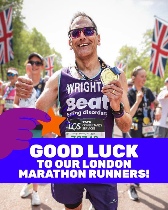 Photo of a white man smiling at the camera, holding up a gold medal to the camera. He is wearing reflective sunglasses, a dark purple Beat-branded running vest, and purple running shorts. Behind him are lots of other runners wearing their medals. In the background are large union jack flags. Over the top of the photo near the bottom is a bright blue textbox with capitalised white text inside reading 'Good luck to our London marathon runners!'