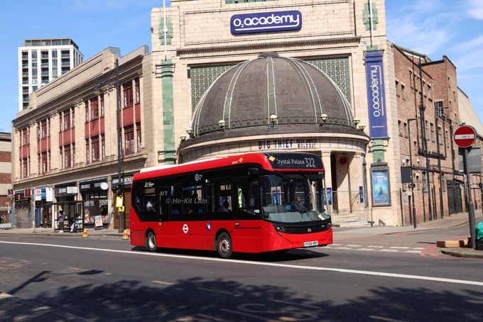 Go Ahead London SEO39 (YX26KBY) is a red Alexander Dennis Enviro100EV and is pictured outside the O2 Academy Brixton as it heads to Crystal Palace on route 322.