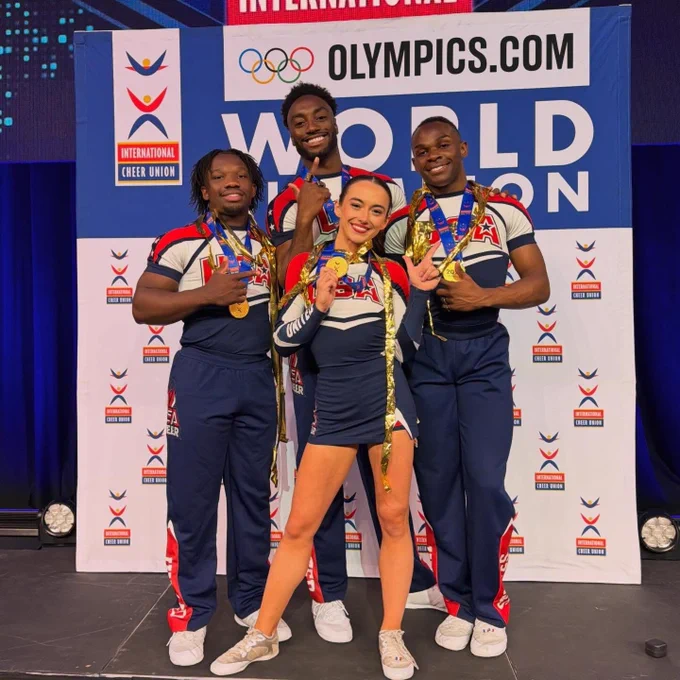 From left to right: Benji Chester, James Thomas, Maddy Brum and Brock Donald pose with their world championship medals.