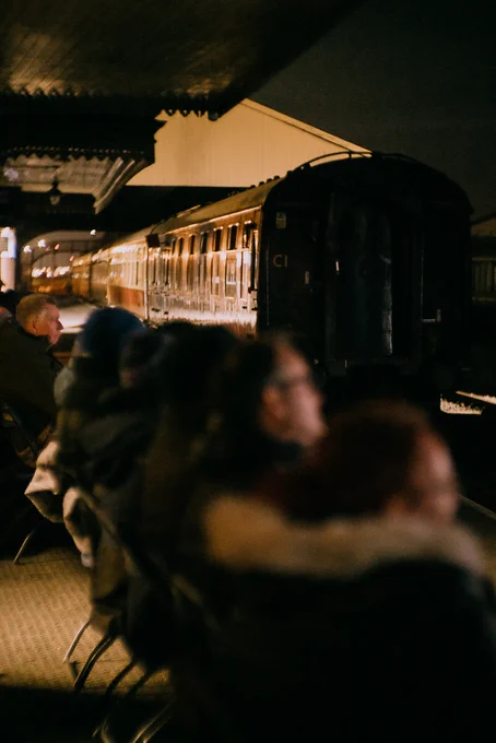 A train is in sharp focus in the distance.
