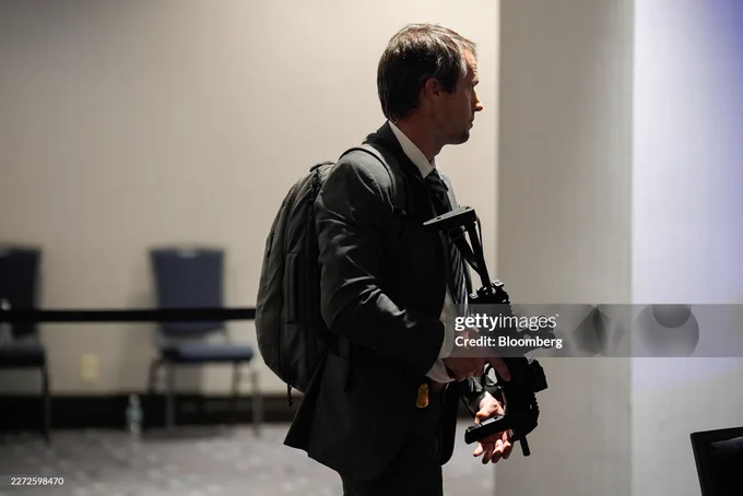 A law enforcement officer responds following reports of a shooting during the White House Correspondents' Association (WHCA) dinner in Washington, DC, US on Saturday, April 25, 2026. President Donald Trump and Vice President JD Vance were evacuated from the White House Correspondents' Association dinner event in Washington Saturday following a security incident at the venue. Photographer: Yuri Gripas/Abaca/Bloomberg via Getty Images