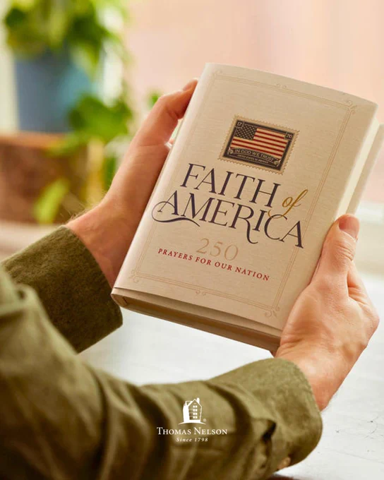 A person holds a book titled "Faith of America: 250 Prayers for Our Nation" with a U.S. flag stamp design on the cover. The logo for Thomas Nelson, a publishing company, is visible at the bottom.
