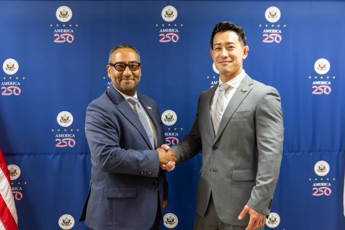 Two men shaking hands.