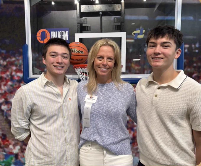 Pictured: 2025 Inductee, Sarah Armington with her children on her induction day.