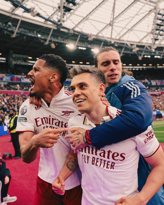 Leandro Trossard, William Saliba and Riccardo Calafiori celebrate our winning goal 