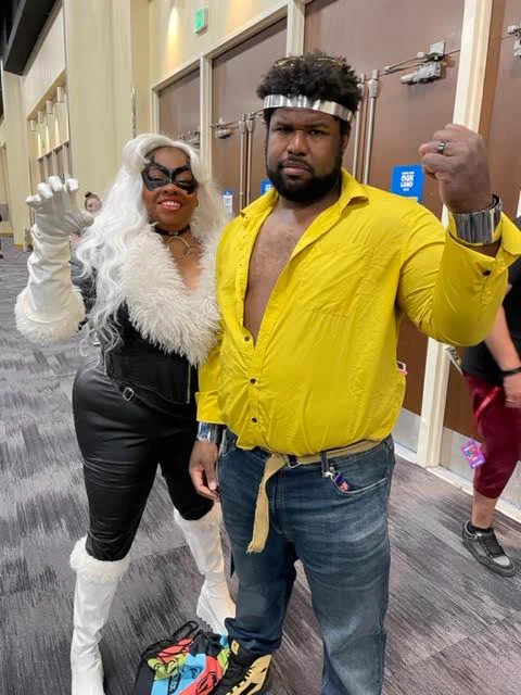cosplayers dressed as Black Cat and Luke Cage at Comic Con Oakland 